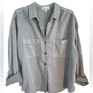 Silver button down denim shirt.
